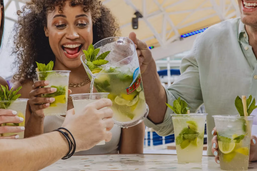 People enjoying mojitos