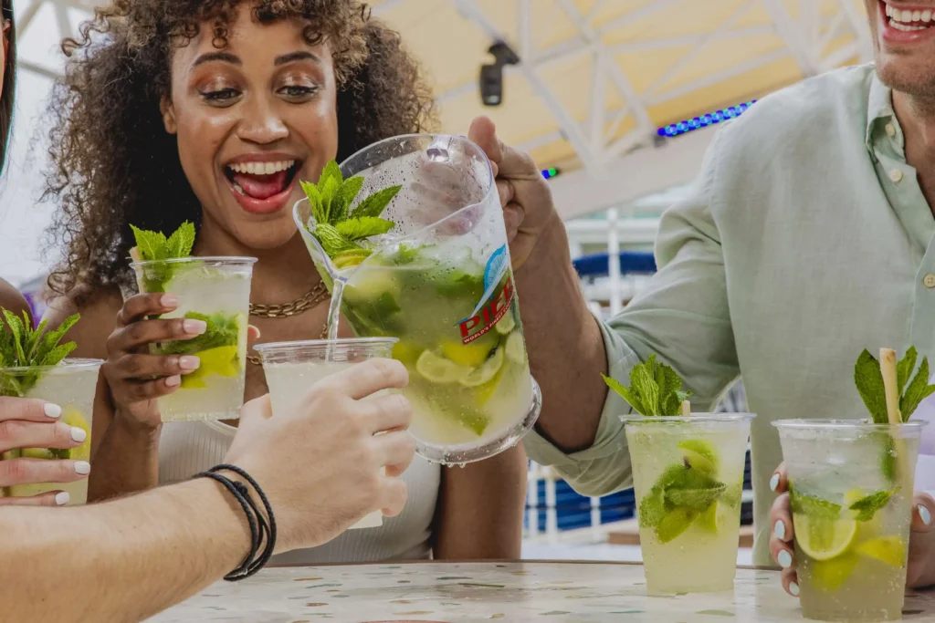 People enjoying mojitos